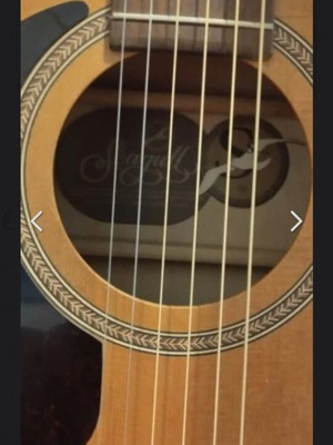 Seagull S6 left-handed acoustic guitar like new with case and strings