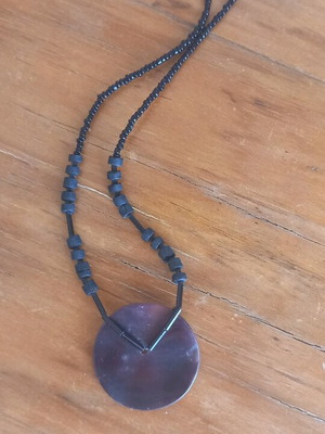 Turtle shell and bead necklace