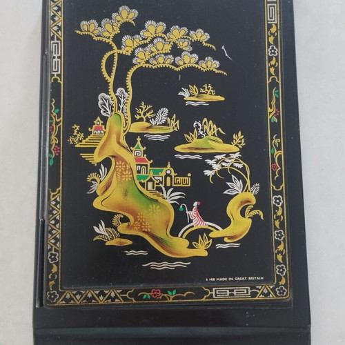 Vintage metal note holder with Chinoiserie design, used