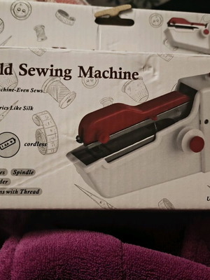 Handheld sewing machine new in box