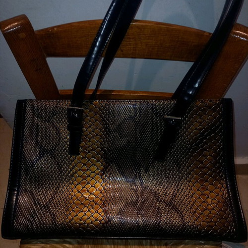 Shoulder bag like new with snake pattern