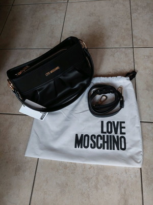 Love Moschino black hand bag new with strap and dustbag