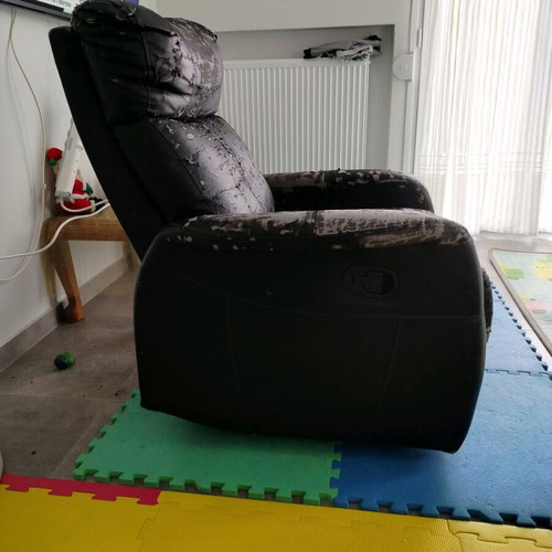 Reclining armchair refurbished leather with damage