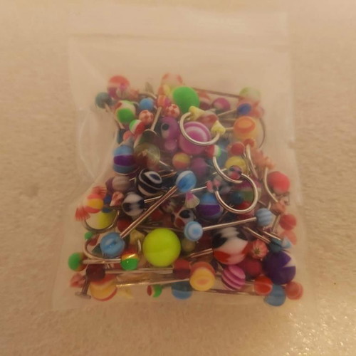 Piercing earrings set like new, 100 pieces, various designs and colors