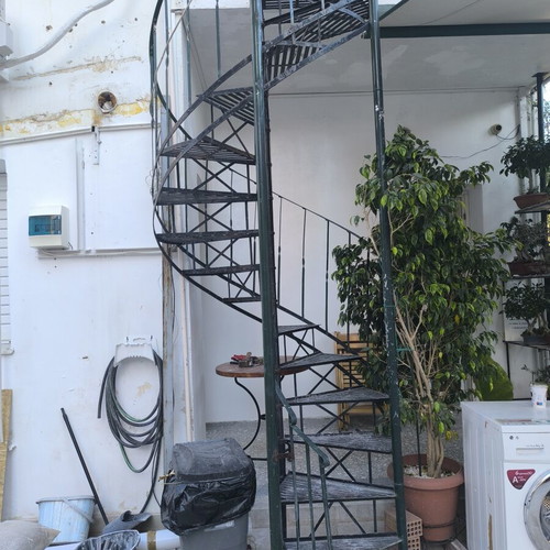 Iron spiral staircase, outdoor, green cypress color