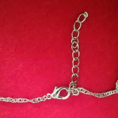 Necklace and matching earrings like new with stone, silver color