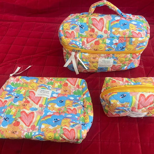 Set of three toiletry bags new, multicolored, various sizes