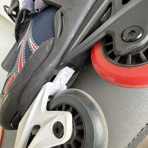 Fila roller skates refurbished with laces, velcro, and ankle buckle