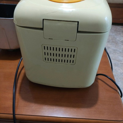 Bread maker used yellow with repaired bowl