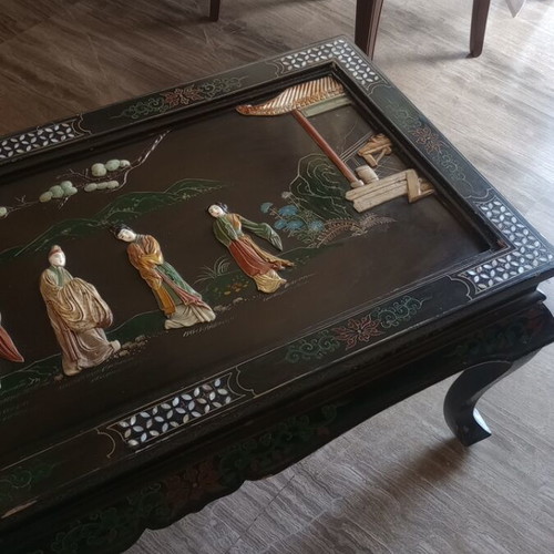 Carved table with folding legs used, traditional Chinese design