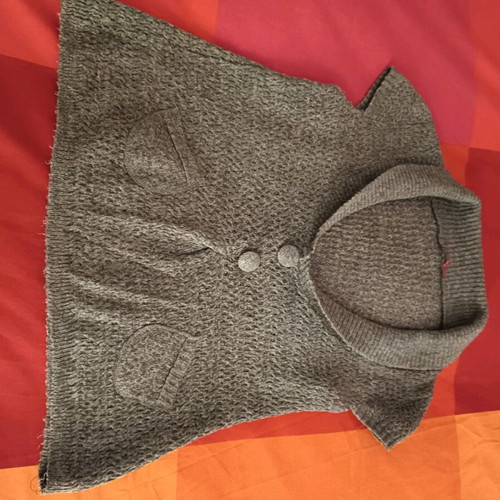 Knitted grey vest like new with short-sleeve sweater and decorative buttons