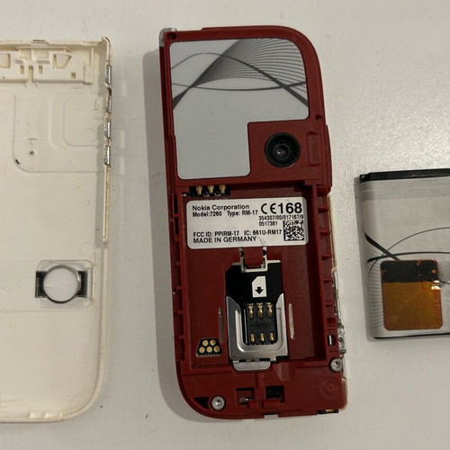 Nokia 7260 used, functional with charger and hands free
