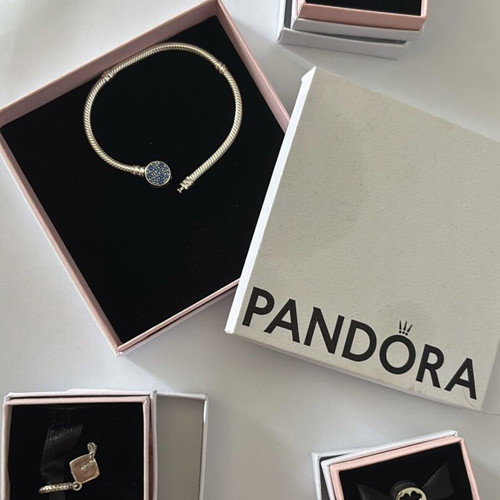 Pandora bracelet with 3 charms like new