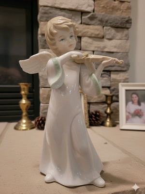 Porcelain angel figurine playing violin