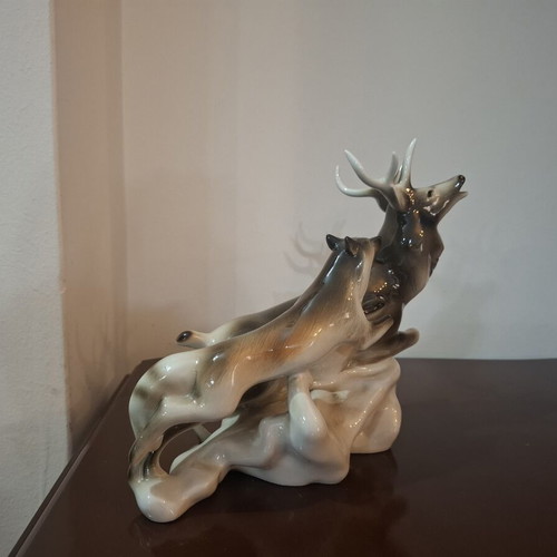 Royal Dux Bohemia porcelain figurine like new, deer and wolf scene