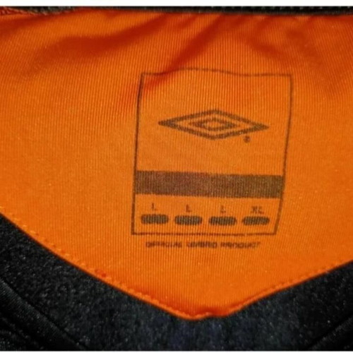 Umbro men's short-sleeve sports shirt used, black and orange, size L