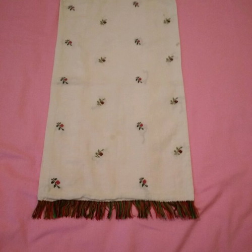 Woven table runner used with small woven flowers and fringe