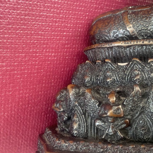 Thai Buddha statue with detailed embossed decoration