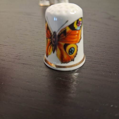 Vintage porcelain thimbles with butterfly, like new