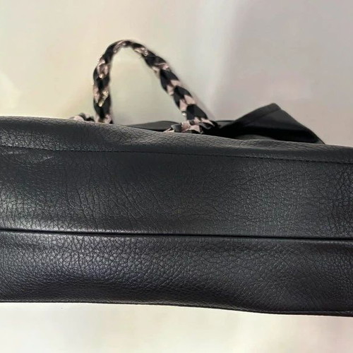 Black shoulder bag tote style like new with inner pockets and silver handle detail