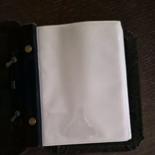 Photo album used with external frame