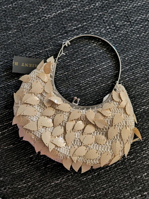 Handbag new evening with knitted material and decorative leaves