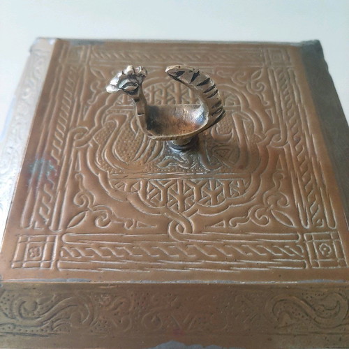 Oriental copper box used with carved decorations