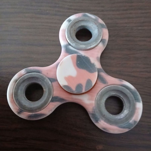 Fidget spinner with red tiger design, like new