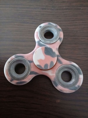 Fidget spinner with red tiger design, like new