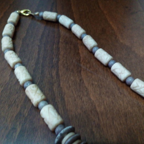 Ethnic necklace used carved bone and wood