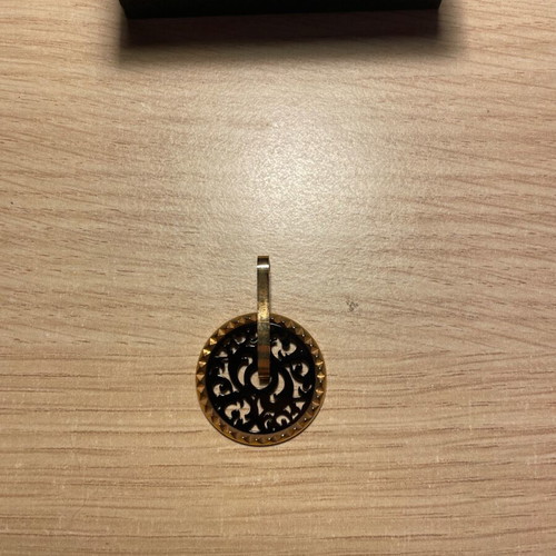 Oxette charm like new, black and gold