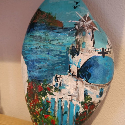 Painted stone new with acrylics and glossy varnish
