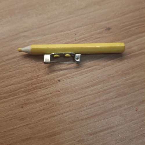 Yellow pin brooch