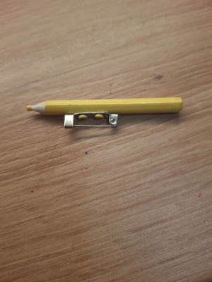 Yellow pin brooch