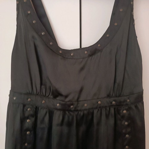 Black mini dress used with small gold studs