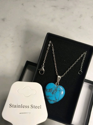 Turquoise crystal heart pendant like new with stainless steel chain