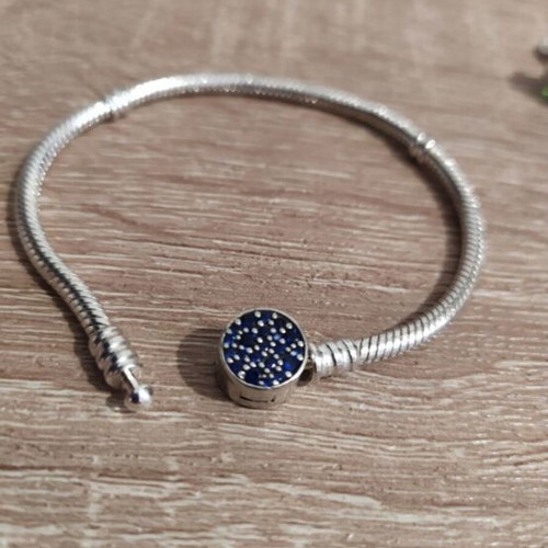 Pandora 925 silver bracelet with blue zircon stones clasp