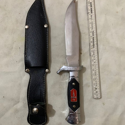Decorative knife used with sheath and cracked aluminum handle