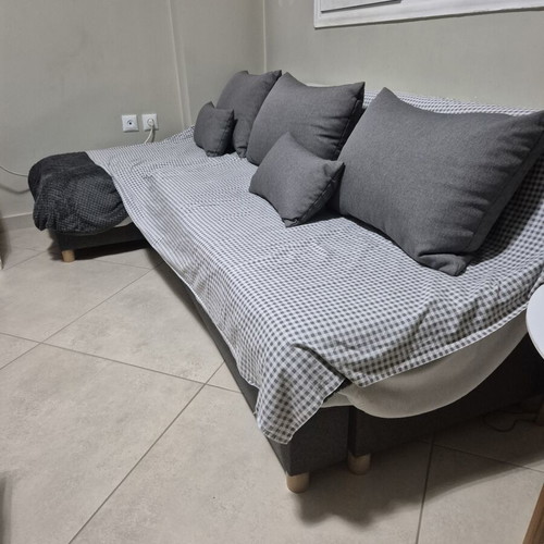 Corner sofa bed with storage, used