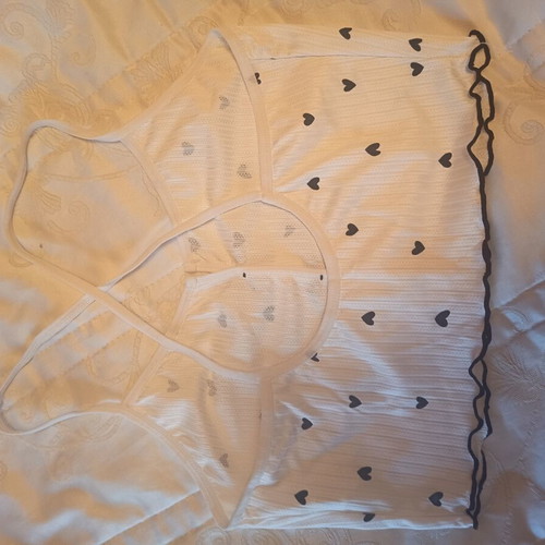 Women's white crop top with black hearts