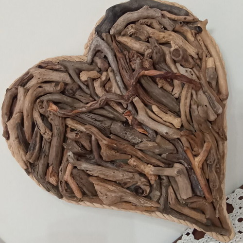 Handmade decorative heart with driftwood