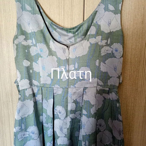 Lola cocktail dress like new, midi green with silver patterns
