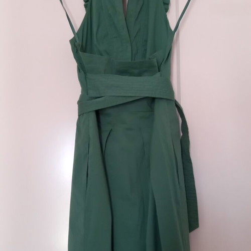 BCBG Maxazria green dress with pockets, backless, size M