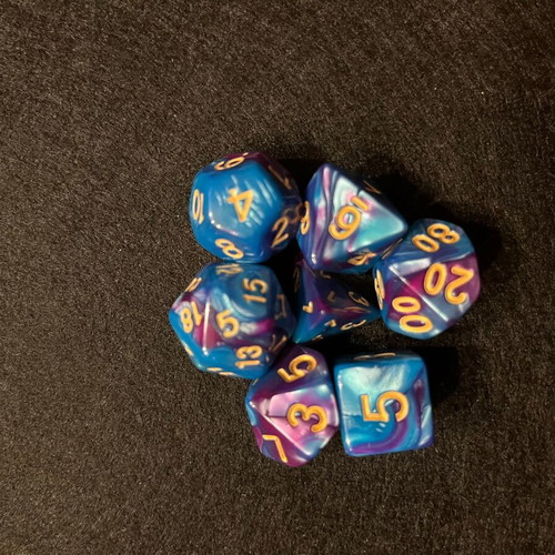 Blue and purple D&D dice set with dice bag