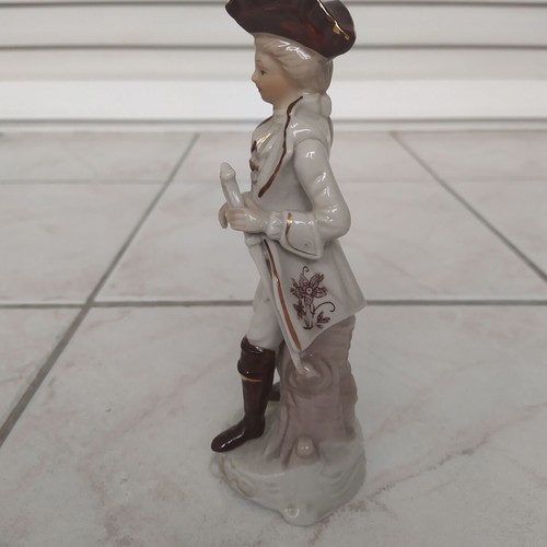 Vintage figurine of young high society man like new, height 18 cm
