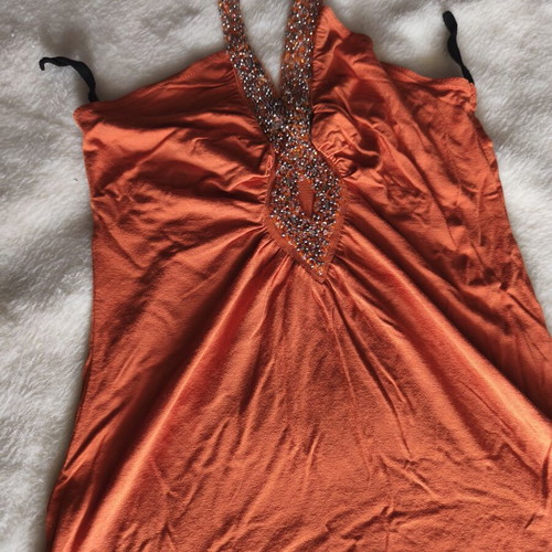 Orange blouse with embroidered beads, like new