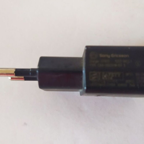 Mobile phone chargers and connection cables used, single piece