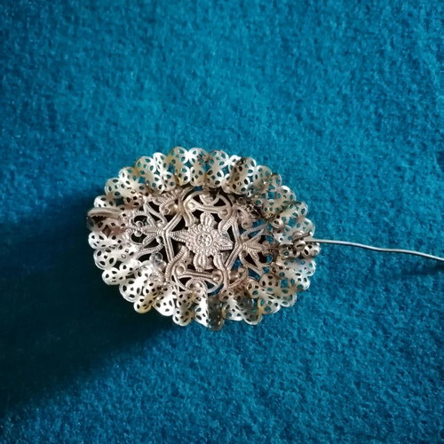 Vintage filigree brooch like new with central stone and rose crystals