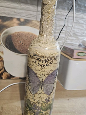 Handmade bottle new with decoupage technique