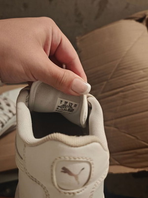 Puma women's white athletic shoes like new, size 37